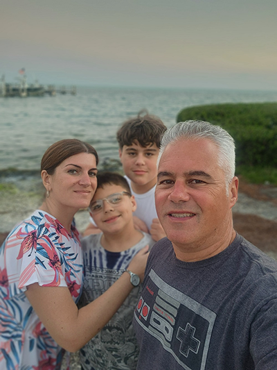 The four of us during a trip down to the Marathon in Florida with the ocean in the background.